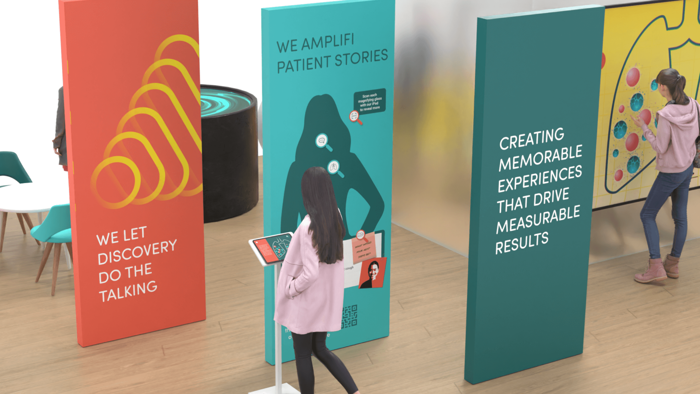 A person walking past a series of poster panels in aqua and coral saying 'creating memorable experiences that drive measurable results and 'we Amplifi patient stories'