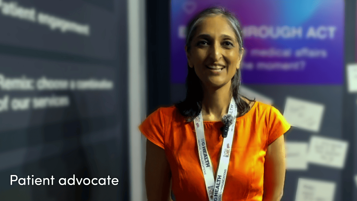 Person talking with a blurred background and text saying patient advocate