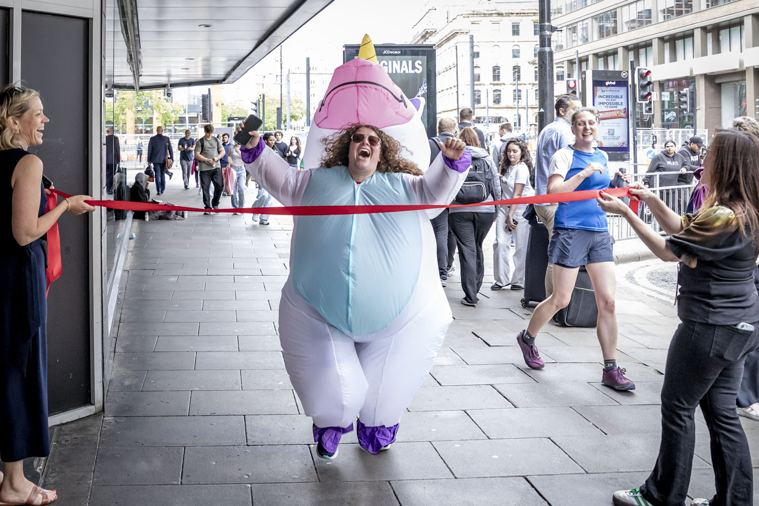 An Amiculum team member completing their charity run during the company's summer event